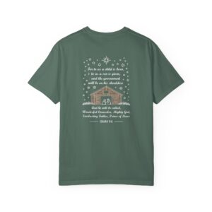 Green Christian t-shirt with Isaiah 9:6 scripture, stars and barn design.