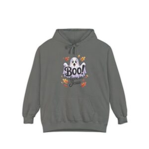 Model on a Halloween set wearing a Gray Boo! -lieve in Jesus Halloween Hoodie, design showing a cute ghost with fall leaves.