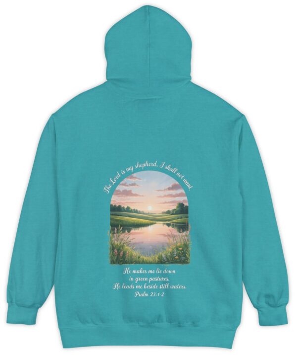 Tropical blue green Comfort Color hoodie sweatshirt with a meadow, pond and wildflowers with The Lord is my shepherd, I shall not want. He makes me lie down in green pastures. He leads me beside still waters. printed on it. Psalm 23:1-2