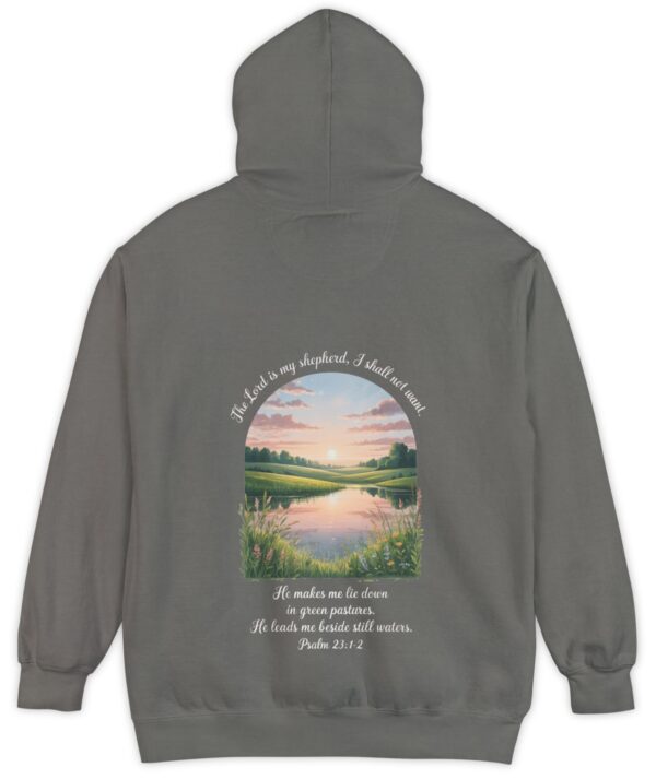 Grey Comfort Color hoodie sweatshirt with a meadow, pond and wildflowers with The Lord is my shepherd, I shall not want. He makes me lie down in green pastures. He leads me beside still waters. printed on it. Psalm 23:1-2