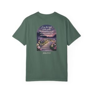Green Christian t-shirt with John 8:12 scripture, lit stairway path with flowers and sunset design.