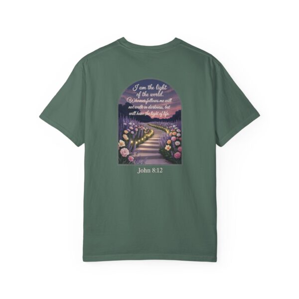 Green Christian t-shirt with John 8:12 scripture, lit stairway path with flowers and sunset design.