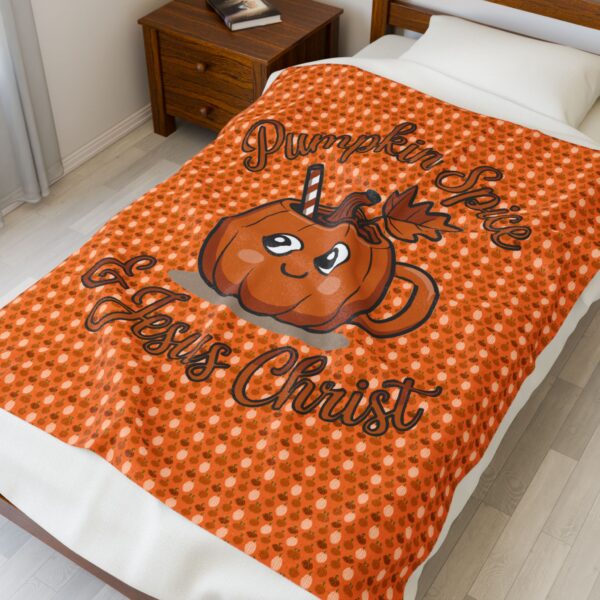Model of Pumpkin Spice and Jesus Christ Velveteen Blanket 1