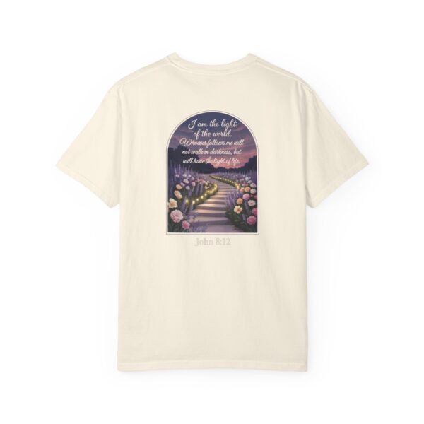Ivory Christian t-shirt with John 8:12 scripture, lit stairway path with flowers and sunset design.