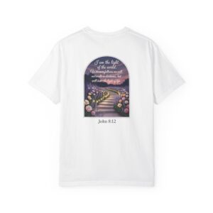 White Christian t-shirt with John 8:12 scripture, lit stairway path with flowers and sunset design.