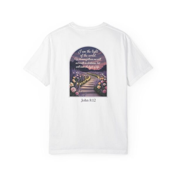 White Christian t-shirt with John 8:12 scripture, lit stairway path with flowers and sunset design.