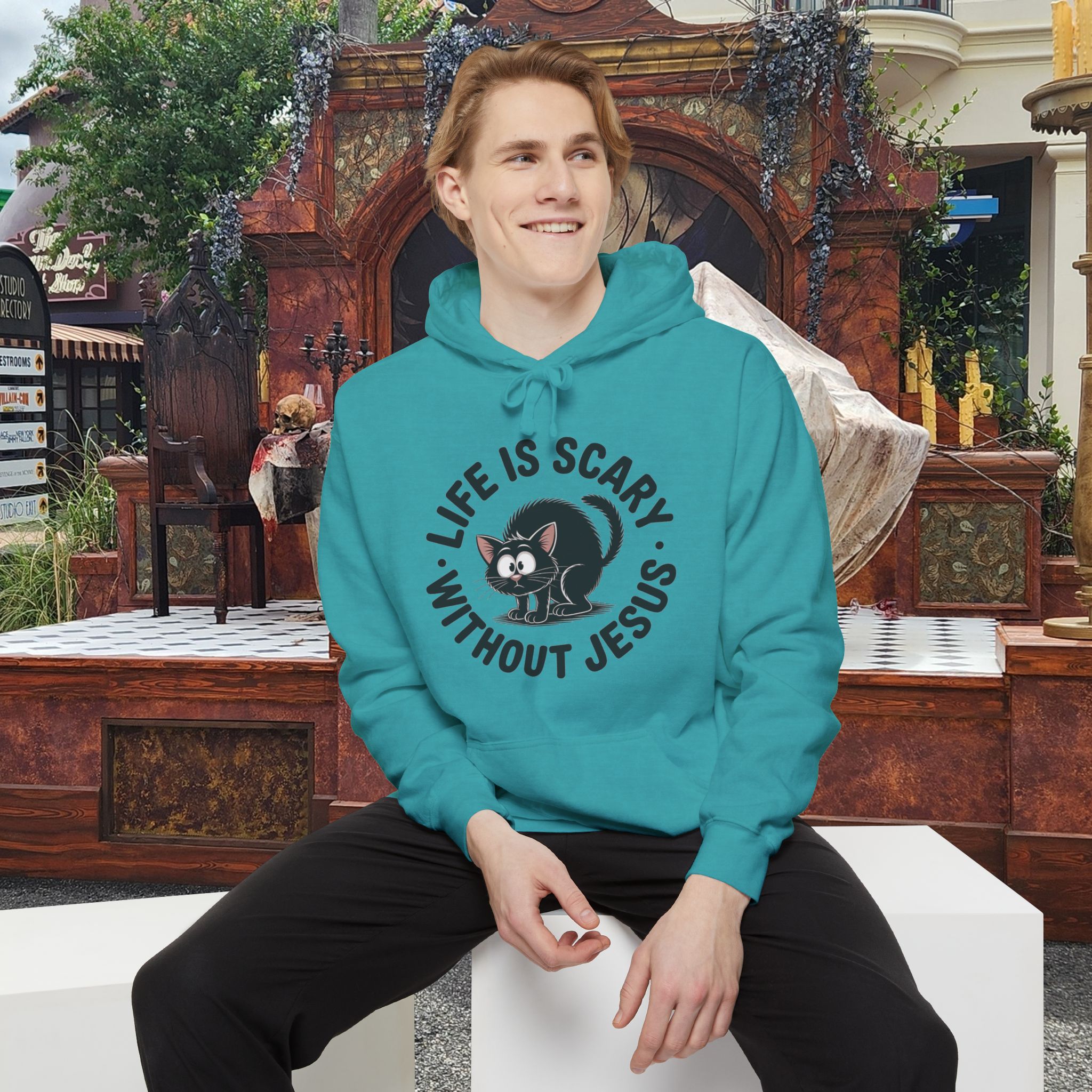 Teal Life is Scary Without Jesus Halloween Hoodie, design showing a cute frightened black cat.