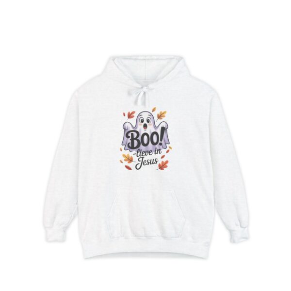 Model on a Halloween set wearing a White Boo! -lieve in Jesus Halloween Hoodie, design showing a cute ghost with fall leaves.