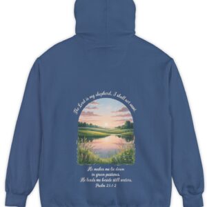 Blue Comfort Color hoodie sweatshirt with a meadow, pond and wildflowers with The Lord is my shepherd, I shall not want. He makes me lie down in green pastures. He leads me beside still waters. printed on it. Psalm 23:1-2