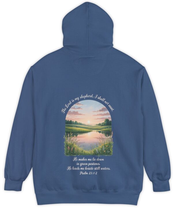 Blue Comfort Color hoodie sweatshirt with a meadow, pond and wildflowers with The Lord is my shepherd, I shall not want. He makes me lie down in green pastures. He leads me beside still waters. printed on it. Psalm 23:1-2