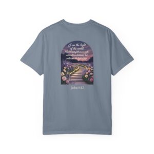 Blue Christian t-shirt with John 8:12 scripture, lit stairway path with flowers and sunset design.