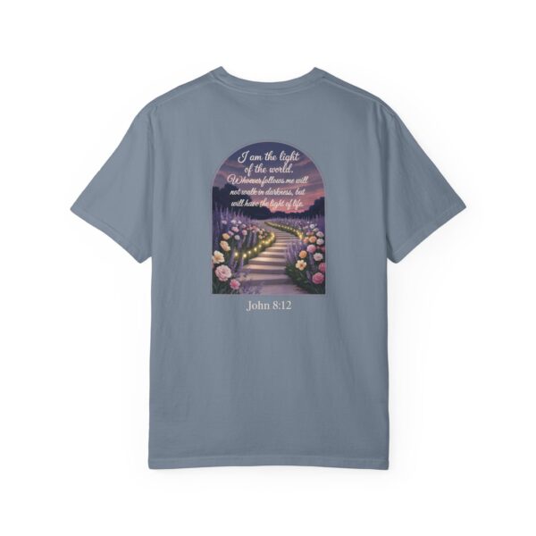 Blue Christian t-shirt with John 8:12 scripture, lit stairway path with flowers and sunset design.