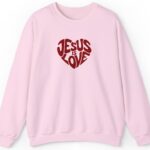 Light Pink Gildan Jesus is Love Christian Embroidered Sweatshirt with a dark red embroidered heart that forms the words "Jesus is Love".